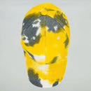 front of yellow tie-dyed hat